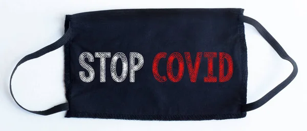 Fekete Eldobható Védőmaszk Stop Covid Szöveggel Fekete Alapon — Stock Fotó