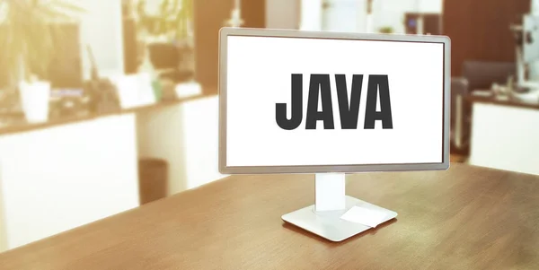 屏幕上有Java文本的现代办公室监视器 — 图库照片