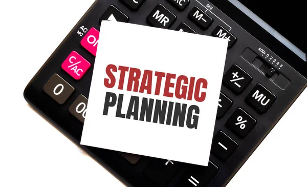 Kalkulator Tekstem Strategic Planning Białym Papierem — Zdjęcie stockowe