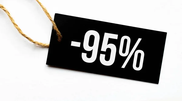 Verkauf Prozent Text Auf Einem Schwarzen Tag Auf Weißem Papier — Stockfoto