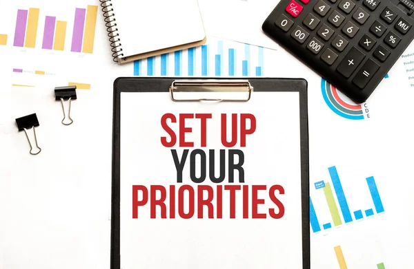 Paper Plate Text Set Your Priorities Diagram Calculator Notepad White — Stock Photo, Image