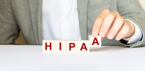 Word HIPAA made with wood building blocks