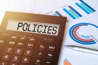 Hesap makinesinde Kelime Politikası. İş ve finans kavramı.