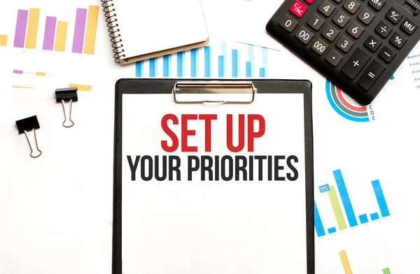 Paper Plate Text Set Your Priorities Diagram Calculator Notepad White — Stock Photo, Image