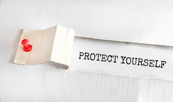 Tekst Protect Yourself Verschijnt Achter Gescheurd Geel Papier — Stockfoto