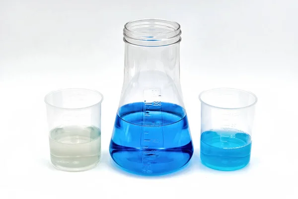 One Flask Blue Content Two Laboratory Beakers Perfect Medical Field — Stock Photo, Image