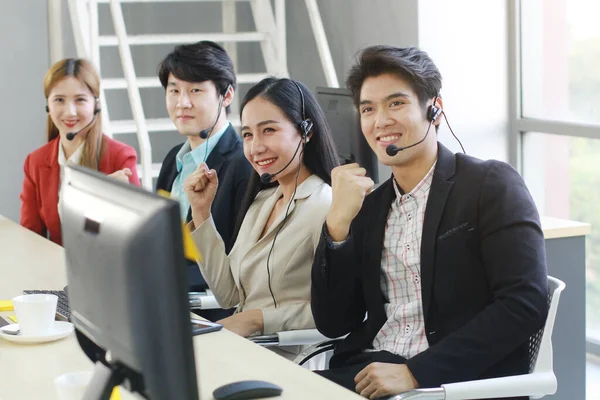 Powerful and Sucessful of Business group Call Center and technical Support staff for receptionist phone operator. Asian customer support team.