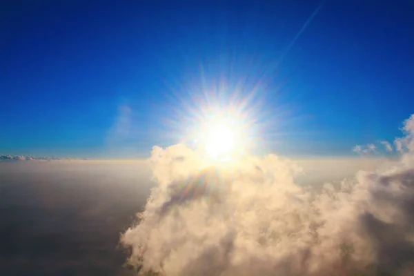 Golden light with sunrise in morning on the sky and cloud .Fog cover the jungle hill in Thailand