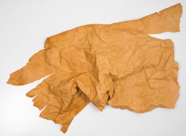 Eski grunge kağıt dokusu. Kağıdın dokusu ıslak, eski, zamanla sararmış. Yırtılmış, lekelenmiş.