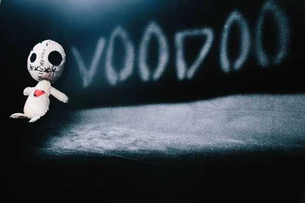 voodoo doll for your magic ritual on a black background