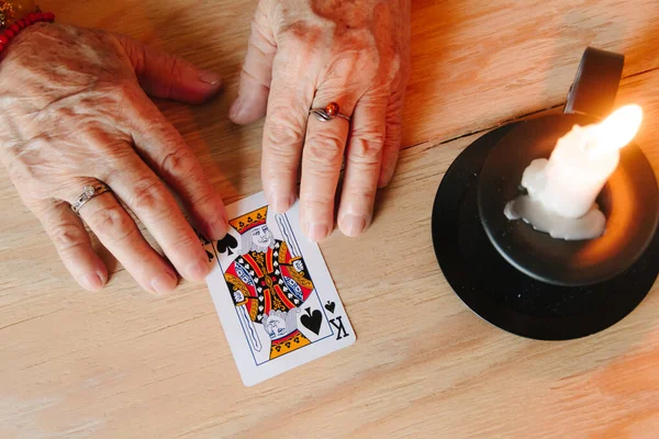 Guessing cards reading, grandma magic, fortune telling, women hands, destiny prediction