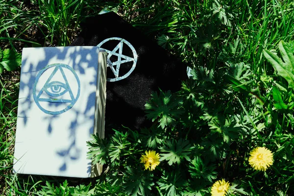 Books of white and black magic. Beautiful occult ritual. Power of nature. Spritual mood.