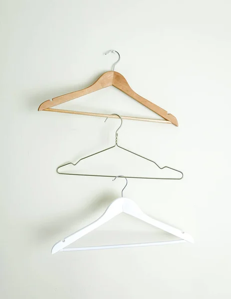 Three Different Empty Hanger on Wall Close Up — Stock Photo, Image