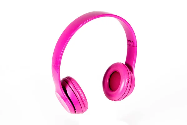 Modern pink Bluetooth headphones on white background — Stock Photo, Image