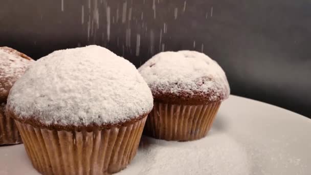 Fragrant cake sprinkled with powdered sugar. slow motion — Stock Video