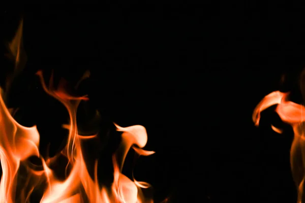 Fire flames on black background — Stock Photo, Image