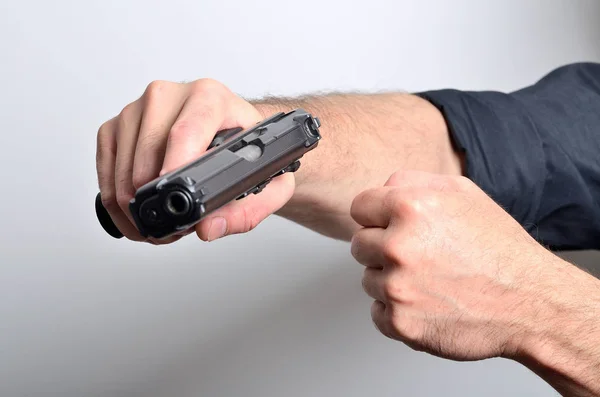 Man threats with gun, threating gesture — Stock Photo, Image