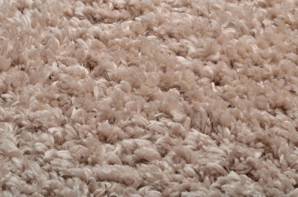 Texture of modern beige shaggy carpet - background — Stock Photo, Image
