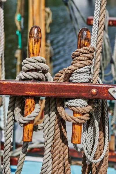 Details of a historic sailing boat anchored in the port of the hanseatic city of Greifswald in Germany.