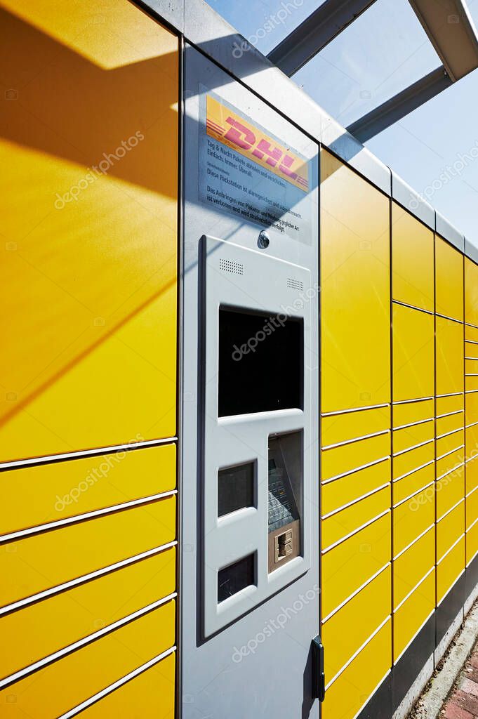 Berlin, Germany - September 17, 2020: Control panel for lockers from DHL for parcels that the recipient can pick up there.