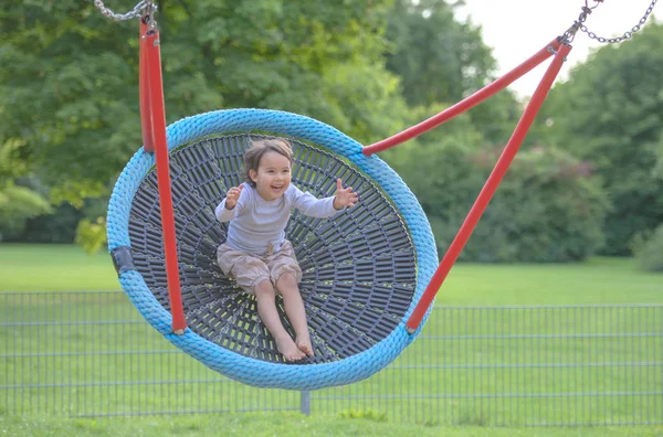 Little Girl Having Fun One Rounded Swing — Stock Photo, Image