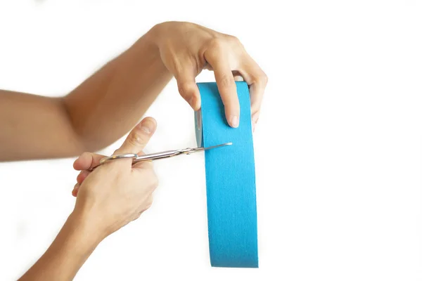 Woman Cutting Physio Tape Rolling White Background — Stock Photo, Image