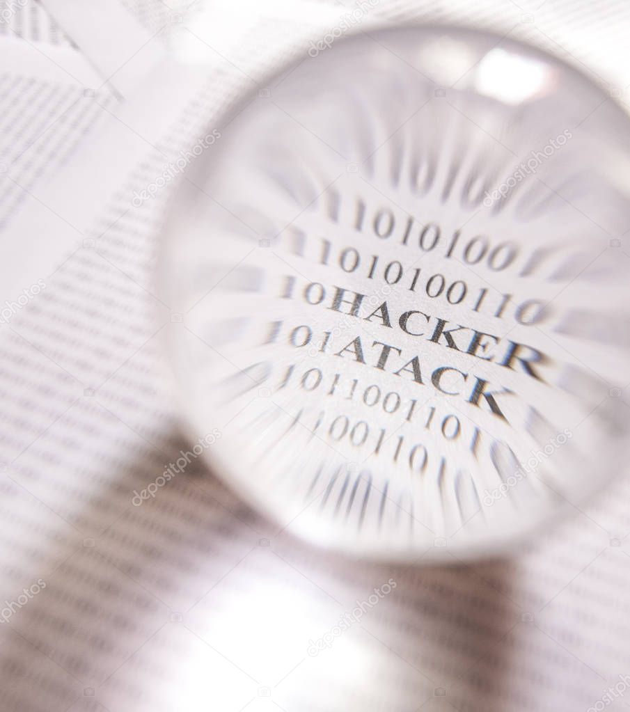 Hacker atack message revealed by an magnifying glass, by an lensball