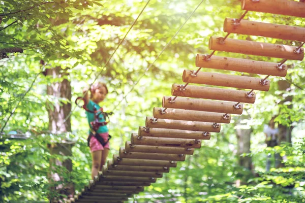 Little Girl Climbing Adventure Park Boy Enjoys Climbing Ropes Course — Stock Photo, Image