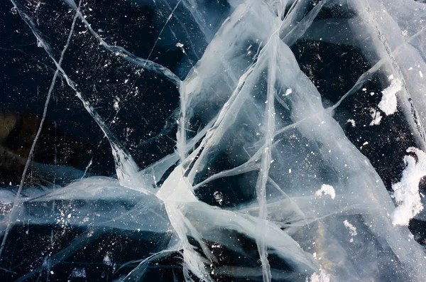 Hielo azul y frío del lago Baikal. Grietas en el hielo Imagen De Stock