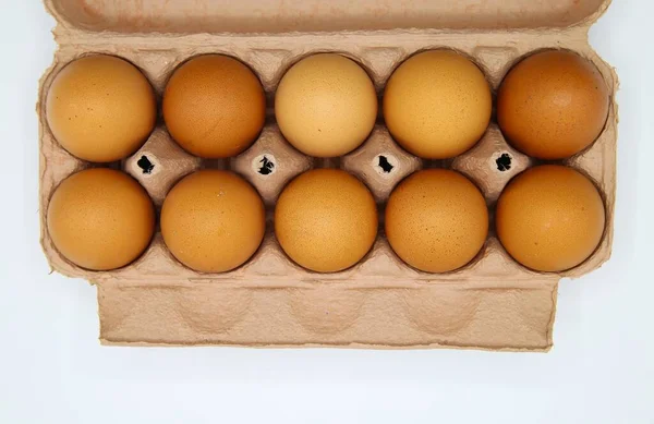 Visão Superior Dez Ovos Marrons Uma Fileira Caixa Papelão — Fotografia de Stock