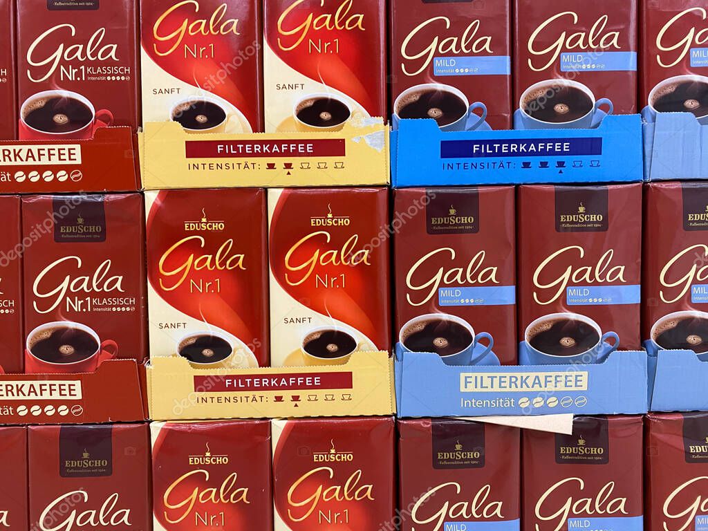 Toenisvorst, Germany - May 14. 2020: View on isolated stacked Eduscho Gala Nr. 1 coffee in shelf of german supermarket