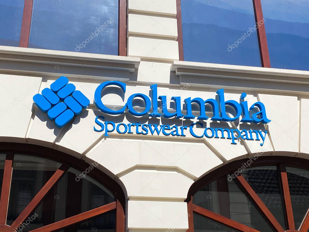 Roermond, Netherlands - May 19. 2020: View on facade with logo lettering of Columbia sportswear company at shop entrance
