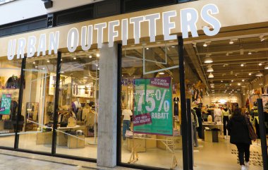Oberhausen, Germany - February 11. 2020: View on entrance of Urban Outfitters fashion chain store clipart