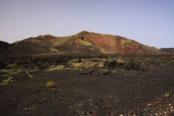 View Black Lava Sand Volcanic Rocks Rugged Red Yellow Mountain — Stock Photo, Image