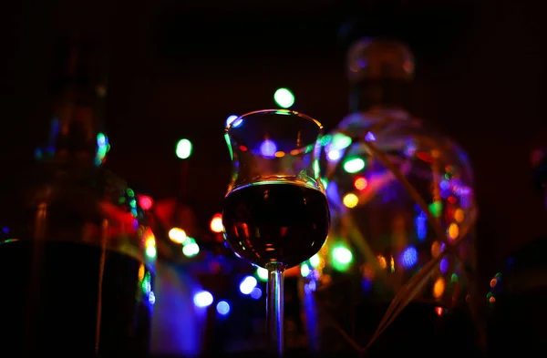 View Isolated Shot Glass Rum Bokeh Vibrant Colors Blurred Bottles — Stock Photo, Image
