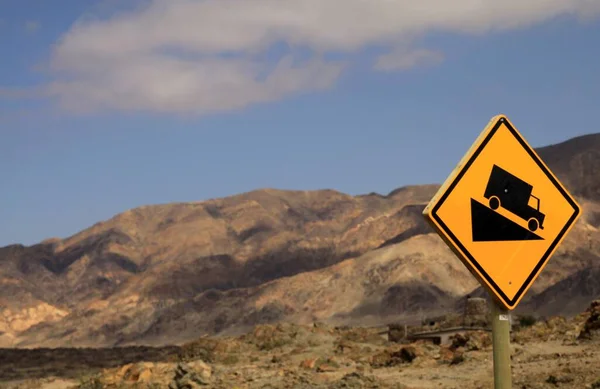 Yellow Isolated Sign Black Truck Dry Arid Environment Warning Steep — Stock Photo, Image