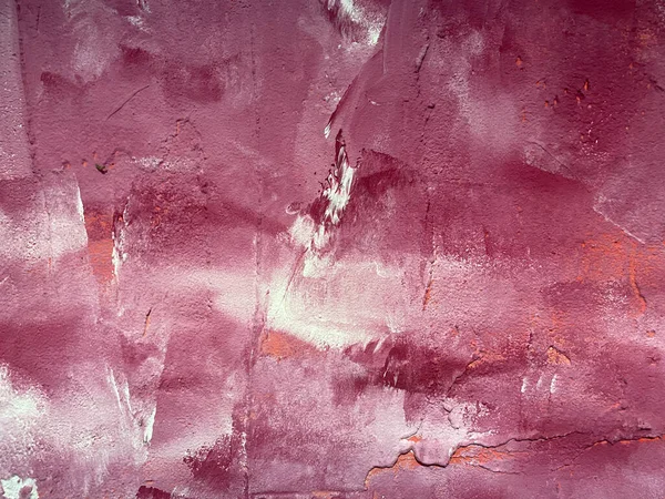 View on wall painted in wipe technique in purple, white and pink colors