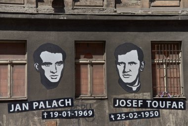 Prague, Czech Republic - July 7, 2017: Portraits and dates of birth and death placed in memory and honor of Jan Palach and Josef Toufar on exterior of a building by the Legerova street in Prague. Palach committed self-immolation on 19 January 1969 in clipart