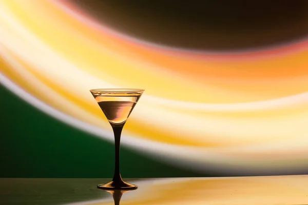 colourful cocktail on the club light background. Party club entertainment. Mixed light