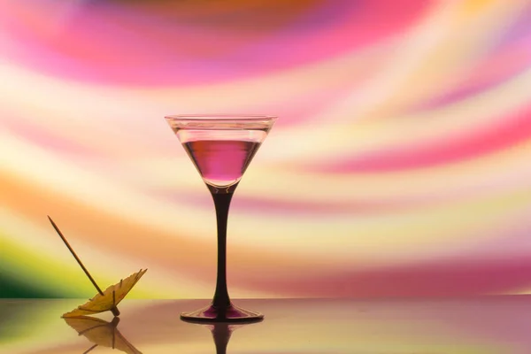 colourful cocktail on the club light background. Party club entertainment. Mixed light
