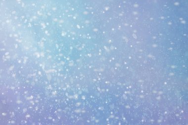 Soyut Mavi bokeh arka plan defocused. Kış kar ile.