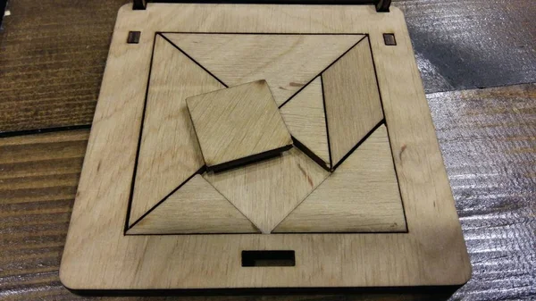 Stück Tangram Puzzle Auf Holztisch — Stockfoto