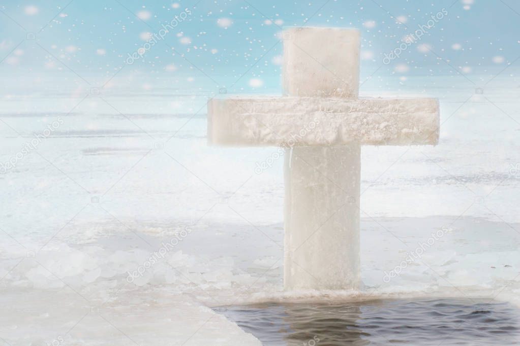 Ice cross hole and a cross of ice for the holidays of Orthodox baptism in Russia