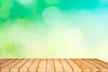 Şablon ürün görüntüleme için sahte bir ülke açık tema ile karşılayan veya gıda arka plan Bahçe bokeh ile boş ahşap masa.