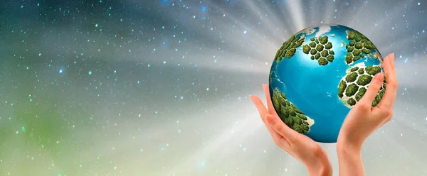 Hands holding a glowing earth - conceptual image of the earth day, saving energy, protecting the environment. Elements of this image furnished by NASA