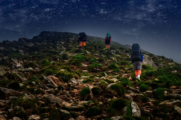 hiking in mountains at night