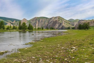 Early morning on the Delger Moron River in Mongolia, with rivers in the background clipart