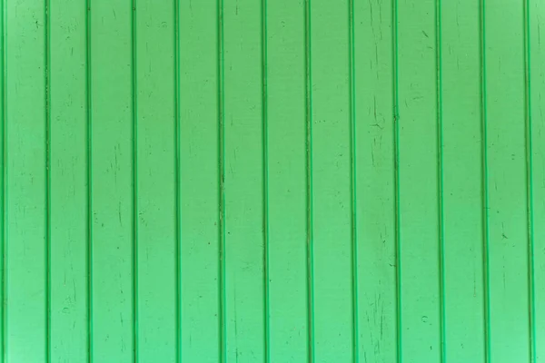 木製のスラットの表面は緑で塗られています — ストック写真