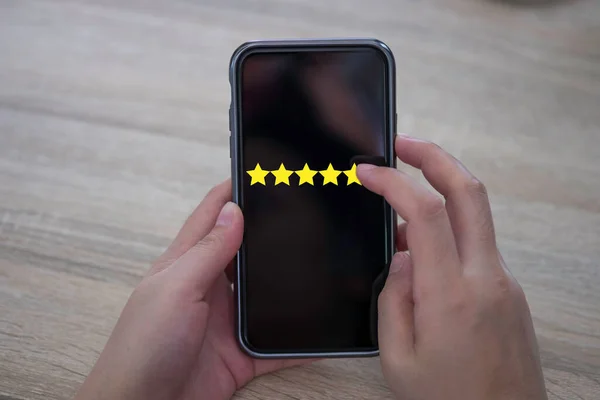 Hands Touch Yellow Stars Increase Satisfaction Rating Mobile Phone Customer — Stock Photo, Image