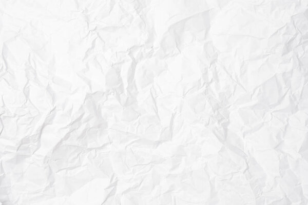 Closeup of white crumpled paper for texture background.